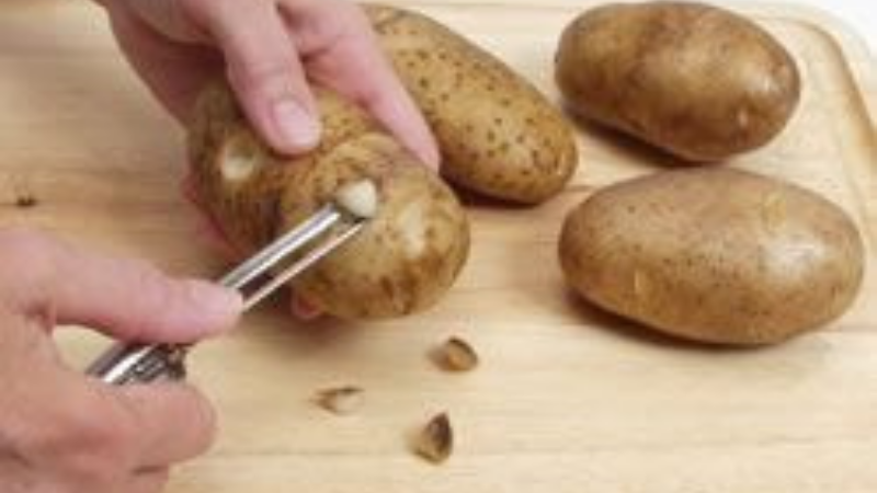 Splitting The Eyes Apart Of The Potatoes