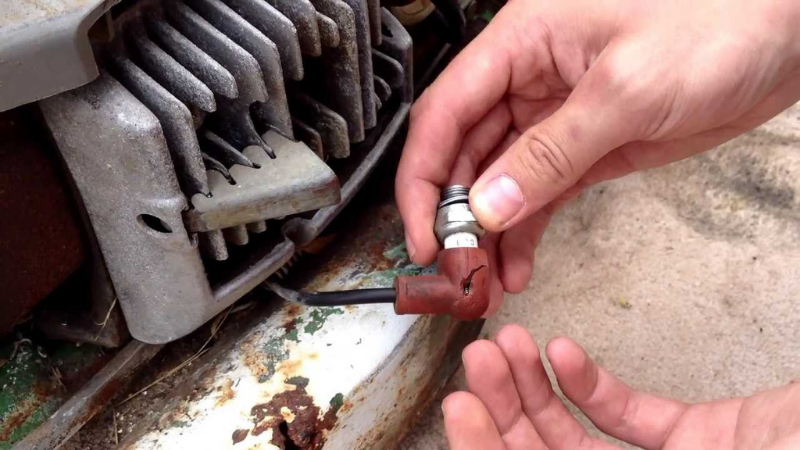 Disconnect The Ignition Boot Of A Lawnmower